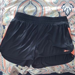 Reebok Black (coral striped side) running shorts